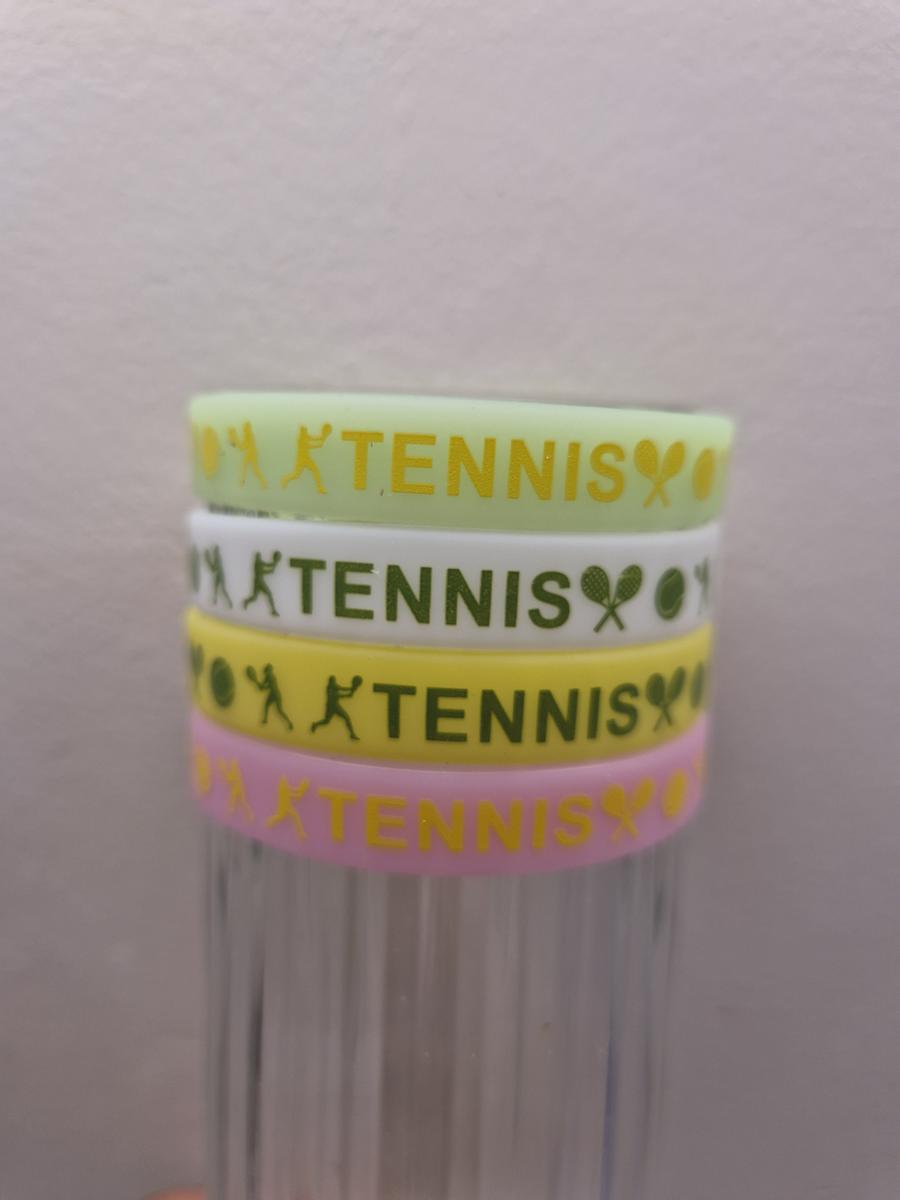 Aligned glow in the dark tennis wristbands